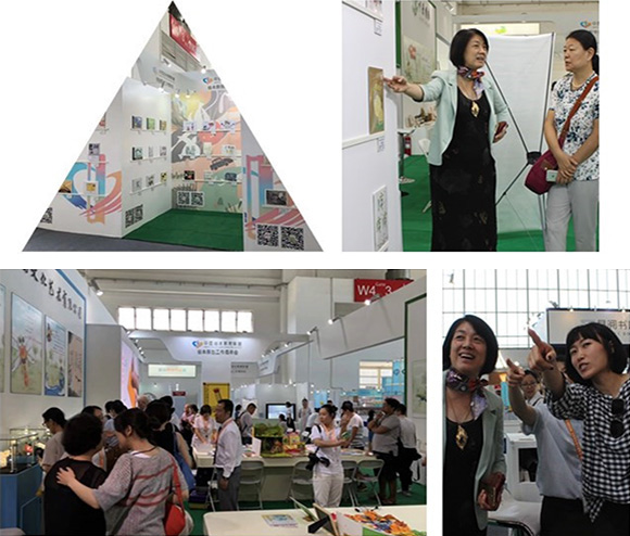 中国数字图书馆副总裁刘小青带领到场师生参观首届中图绘本展 中国数字图书馆副总裁刘小青带领到场师生参观首届中图绘本展